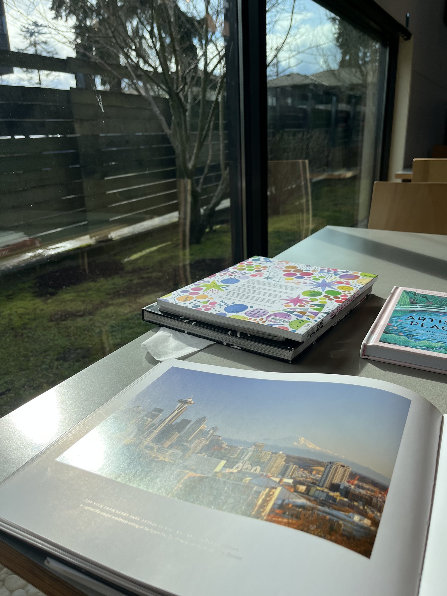Desk research and gathering style, pose, and content references at the Seattle Public Library
